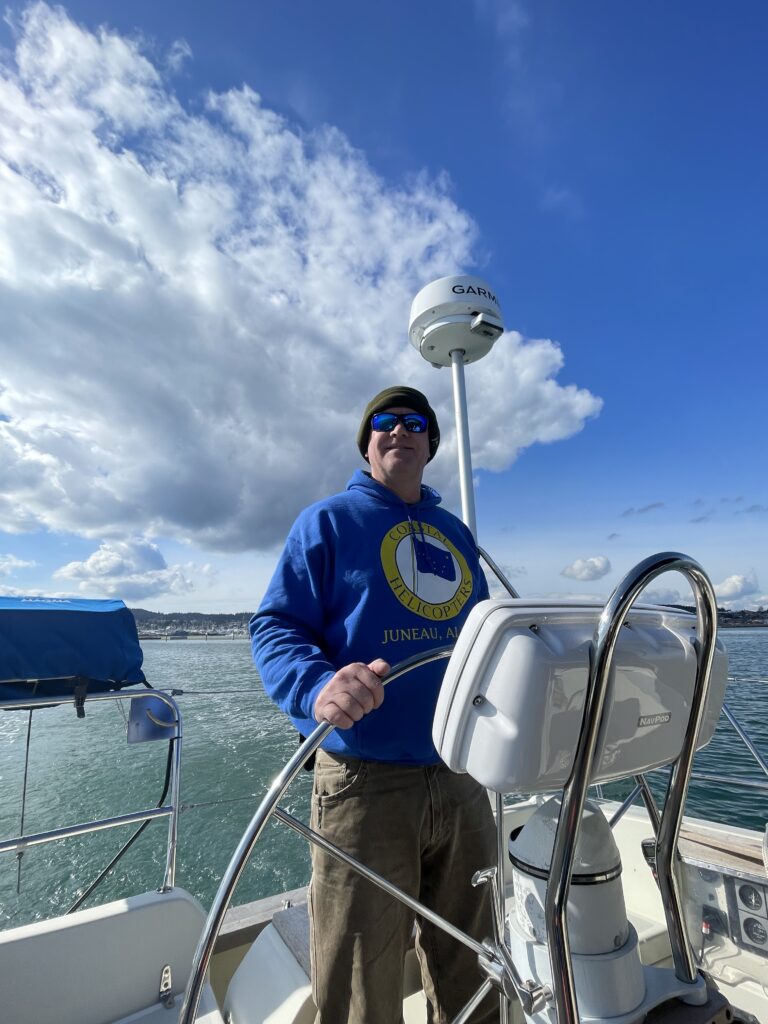 Chris at the Helm of Gypsea Explorer